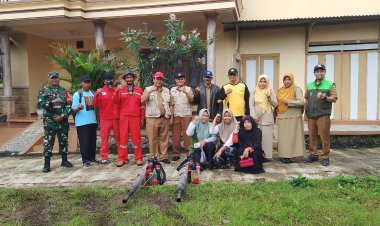 BABINSA DESA TANJUNGSARI KORAMIL 0804/03 PANEKAN BERSAMA DINKES MELAKSANAKAN FOGGING